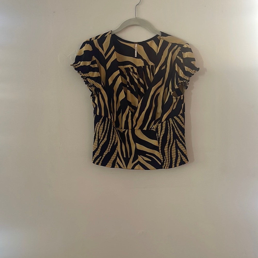 Free people black and tan zebra top